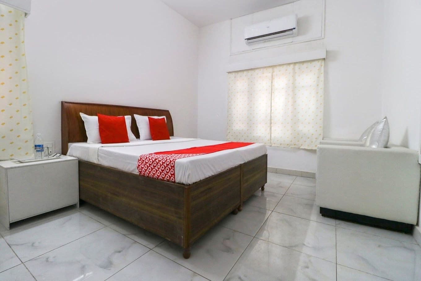 Comfortable room with bedside table